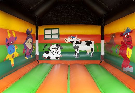 Compre un castillo hinchable estándar para niños en colores llamativos con un gran objeto 3D de una vaca en la parte superior. Castillo hinchable a la venta en línea en JB Hinchables España