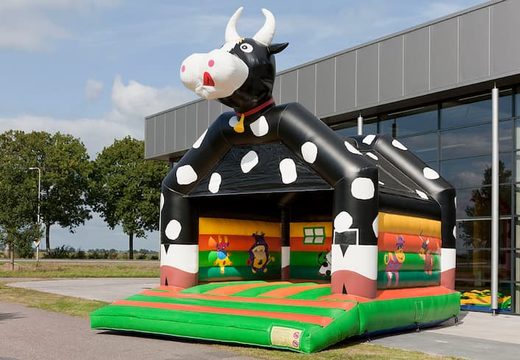 Compra un grande castillo inflable con un tema vaca  para niños. Compra castillos  inflable en línea en JB Hinchables España