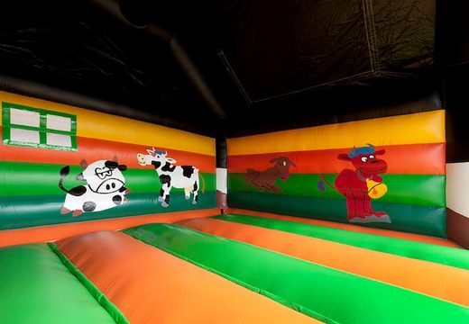 Compra un grande castillo hinchable de interior con un tema vaca para niños. Ordena castillos  inflable en línea en JB Hinchables España